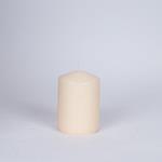 DECORATIVE CANDLE ECRU WITH VANILLA SCENT 7x10cm.